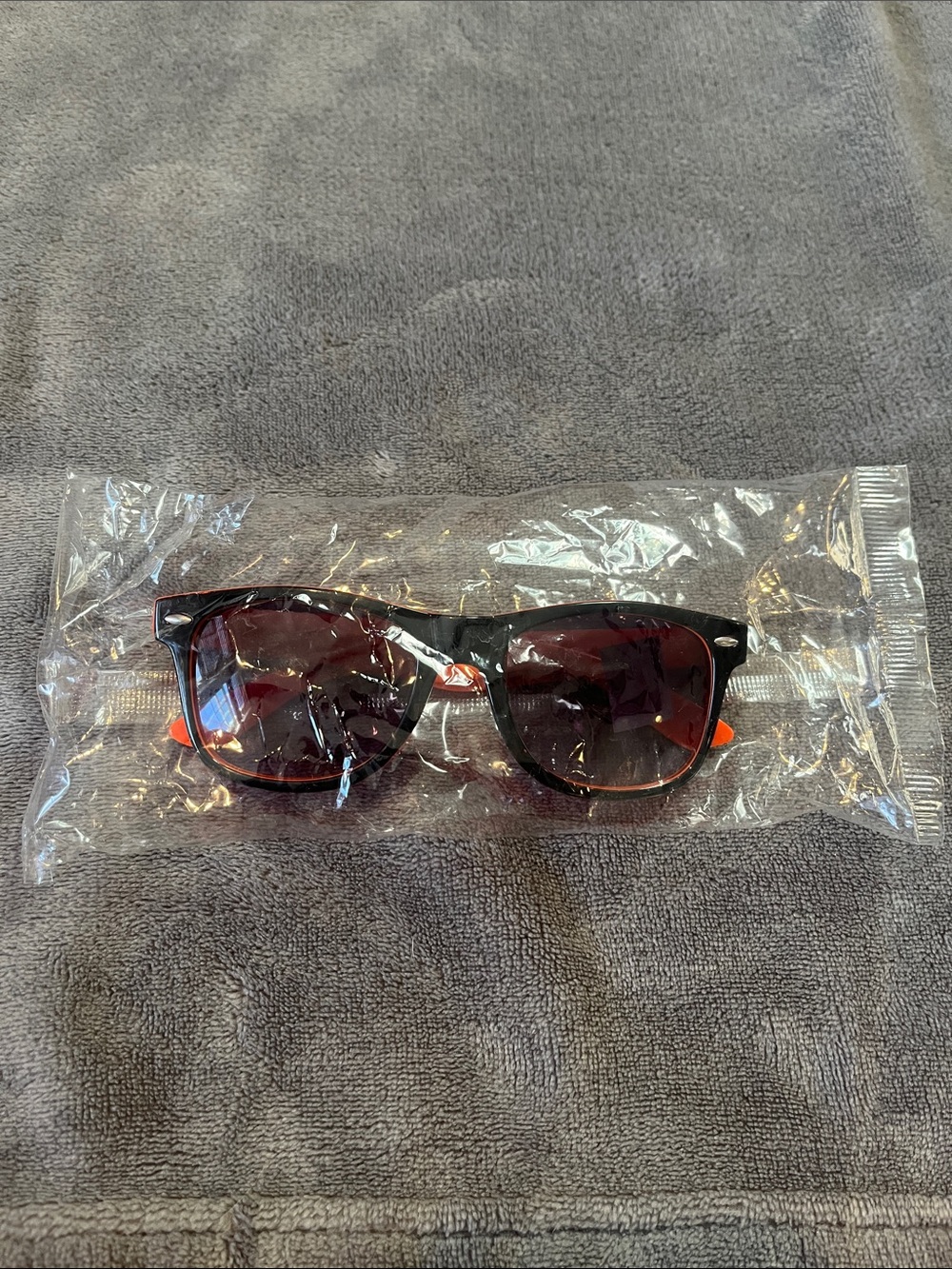 Classic Black Sunglasses with Orange Temple Accents - Women's Fashion Shades